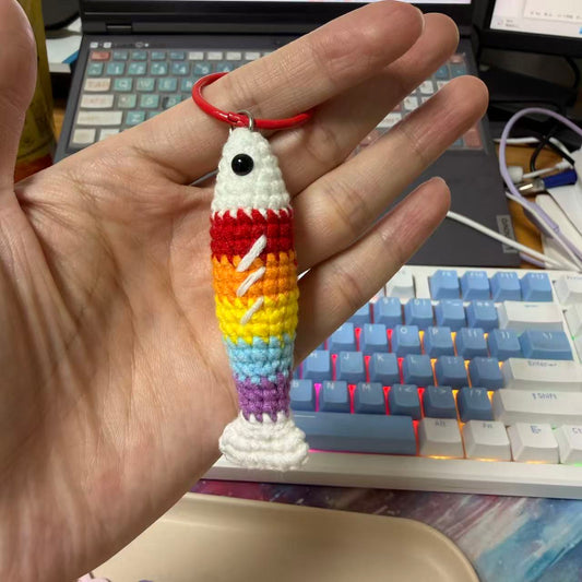 Rainbow fish keychain in hand